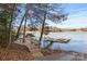 Lakeside view with a dock, promising serene waterside living and recreational opportunities at 4616 Gold Finch Dr, Denver, NC 28037