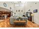 Spacious living room with vaulted ceilings, fireplace, and beautiful hardwood floors at 4616 Gold Finch Dr, Denver, NC 28037