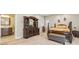 Main bedroom features neutral paint, dark furniture and access to ensuite bathroom at 4616 Gold Finch Dr, Denver, NC 28037