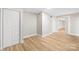 Finished basement showcasing wood-look flooring and large closet at 6529 Harburn Forest Dr, Charlotte, NC 28269