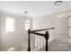 Upstairs landing area featuring modern lighting, and neutral paint at 6529 Harburn Forest Dr, Charlotte, NC 28269