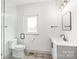 Modern bathroom featuring walk-in glass shower, neutral tile, and vanity with sleek fixtures at 6535 Fisher Farm Nw Ln, Concord, NC 28027