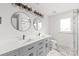 Modern bathroom features dual vanity, stylish fixtures, and a luxurious shower at 6535 Fisher Farm Nw Ln, Concord, NC 28027