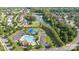 Aerial community view with pool, tennis court, pond and surrounding houses at 7205 Yellowhorn Trl, Waxhaw, NC 28173