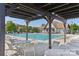 Outdoor community pool with lounge chairs and covered seating area at 7205 Yellowhorn Trl, Waxhaw, NC 28173