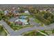 Aerial image of neighborhood pool, clubhouse, tennis courts, and parking at 7205 Yellowhorn Trl, Waxhaw, NC 28173