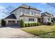 Beautiful home featuring a two-car garage, well-maintained lawn, and architectural details at 7205 Yellowhorn Trl, Waxhaw, NC 28173