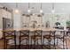 Spacious kitchen featuring a large island with seating and pendant lighting, perfect for entertaining at 7205 Yellowhorn Trl, Waxhaw, NC 28173