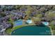 An aerial view of the property with community pool, tennis courts, and lake access at 7214 Quail Meadow Ln, Charlotte, NC 28210