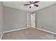 Bedroom boasts neutral paint, carpet, and closet access at 7214 Quail Meadow Ln, Charlotte, NC 28210