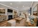 Comfortable living room featuring a fireplace and hardwood floors at 7214 Quail Meadow Ln, Charlotte, NC 28210