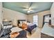 Comfortable bedroom with ceiling fan, a neutral color scheme, and ample natural light at 7532 Red Oak Ln, Charlotte, NC 28226