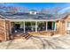 Aerial detail of the pool house showing covered seating and staircase at 7532 Red Oak Ln, Charlotte, NC 28226