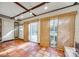 Sunroom with brick floors and wood paneled ceiling, providing a light-filled transition to the outdoors at 7532 Red Oak Ln, Charlotte, NC 28226