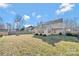 Large backyard shows spacious outdoor retreat, for play, gardening, and relaxation at 8430 Forest Shadow Cir, Cornelius, NC 28031