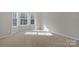 Bright bedroom with bay window offers great natural light and charming architectural detail at 8430 Forest Shadow Cir, Cornelius, NC 28031