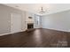 Bright living room with a cozy fireplace and hardwood floors at 8430 Forest Shadow Cir, Cornelius, NC 28031