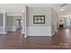 Spacious living room featuring hardwood floors and a fireplace, perfect for entertaining at 8430 Forest Shadow Cir, Cornelius, NC 28031