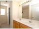 Bathroom featuring double sinks and a large mirror at 920 Lakehill Rd, Charlotte, NC 28214