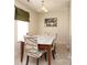 Bright dining room with table and seating, complemented by neutral tones and natural light at 920 Lakehill Rd, Charlotte, NC 28214