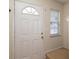 Bright entryway featuring a white door with half-moon window at 920 Lakehill Rd, Charlotte, NC 28214