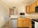 Kitchen featuring stainless steel appliances and light wood cabinets at 920 Lakehill Rd, Charlotte, NC 28214