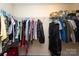 Spacious walk-in closet featuring rod racks to maximize clothing storage and organization at 920 Lakehill Rd, Charlotte, NC 28214