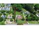 Aerial view of property showing lot size with mature trees and landscaping at 9808 Washam Potts Rd, Cornelius, NC 28031