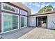 Large back deck with sliding glass doors, great for indoor-outdoor living at 9808 Washam Potts Rd, Cornelius, NC 28031