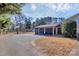 Spacious three-car garage offers ample parking and storage space, enhancing convenience at 9808 Washam Potts Rd, Cornelius, NC 28031