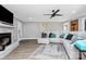 Bright living room with brick fireplace, neutral decor, and access to the outdoors at 9808 Washam Potts Rd, Cornelius, NC 28031