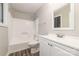 Bathroom features a shower-tub combo and white vanity at 100 Willow Run Dr # 7, Gastonia, NC 28056