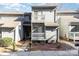 Two-story condo featuring a balcony, sidewalk, and minimal landscaping at 100 Willow Run Dr # 7, Gastonia, NC 28056