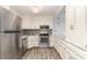 Kitchen featuring stainless appliances, white cabinets, and modern countertops at 100 Willow Run Dr # 7, Gastonia, NC 28056