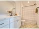 Bathroom with white vanity, elegant faucet, and unique patterned tile flooring at 1013 Oakmont Dr, Rock Hill, SC 29732