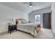 Comfortable bedroom featuring a wooden bed, ceiling fan, and natural light from the window at 1013 Oakmont Dr, Rock Hill, SC 29732