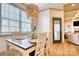 Cozy dining area with hardwood floors, stylish lighting, and a view of the deck at 1013 Oakmont Dr, Rock Hill, SC 29732