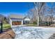 Charming home exterior featuring a gray roof, a spacious driveway, and a cozy front porch, with a lovely yard at 1013 Oakmont Dr, Rock Hill, SC 29732