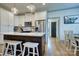 Kitchen island featuring a marble countertop, stainless steel appliances, and a breakfast bar at 1013 Oakmont Dr, Rock Hill, SC 29732