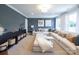 Cozy living room with large sectional sofa, decorative pillows, soft rug and contemporary furnishings at 1055 Kinship Dr # 78, Lancaster, SC 29720