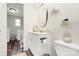 Well-lit bathroom showcases vanity, mirror, and toilet for a modern and clean look at 1061 Gaither Nw Pl, Concord, NC 28027