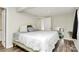 Bedroom with modern decor, plush bedding, and easy access to the closet, creating a relaxing sanctuary at 1061 Gaither Nw Pl, Concord, NC 28027