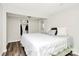 Cozy bedroom with plush bedding and a spacious closet, offering a comfortable retreat at 1061 Gaither Nw Pl, Concord, NC 28027