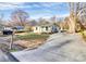 An inviting bungalow with a covered front porch and a private driveway at 1061 Gaither Nw Pl, Concord, NC 28027