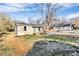 An inviting bungalow with a covered front porch and a spacious yard at 1061 Gaither Nw Pl, Concord, NC 28027