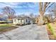 Charming home with a well-maintained yard and a spacious concrete driveway at 1061 Gaither Nw Pl, Concord, NC 28027