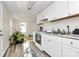 Spacious kitchen with modern appliances and a view into the living area at 1061 Gaither Nw Pl, Concord, NC 28027