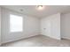Bedroom with carpeted floors, a window for natural light, and a double-door closet at 11440 Westbranch Pkwy, Davidson, NC 28036
