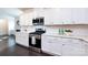Contemporary kitchen featuring white cabinetry, quartz countertops, and stainless steel appliances at 11440 Westbranch Pkwy, Davidson, NC 28036