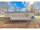 A spacious back deck is perfect for entertaining or relaxing outdoors at 120 Roger Dr, Statesville, NC 28625